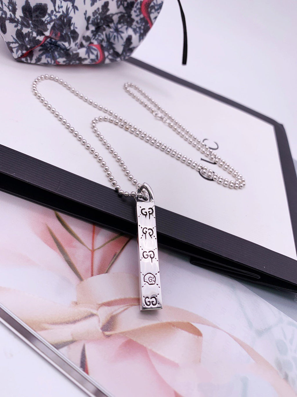 Gucci GG Sterling Silver Ghost Bar Pendant