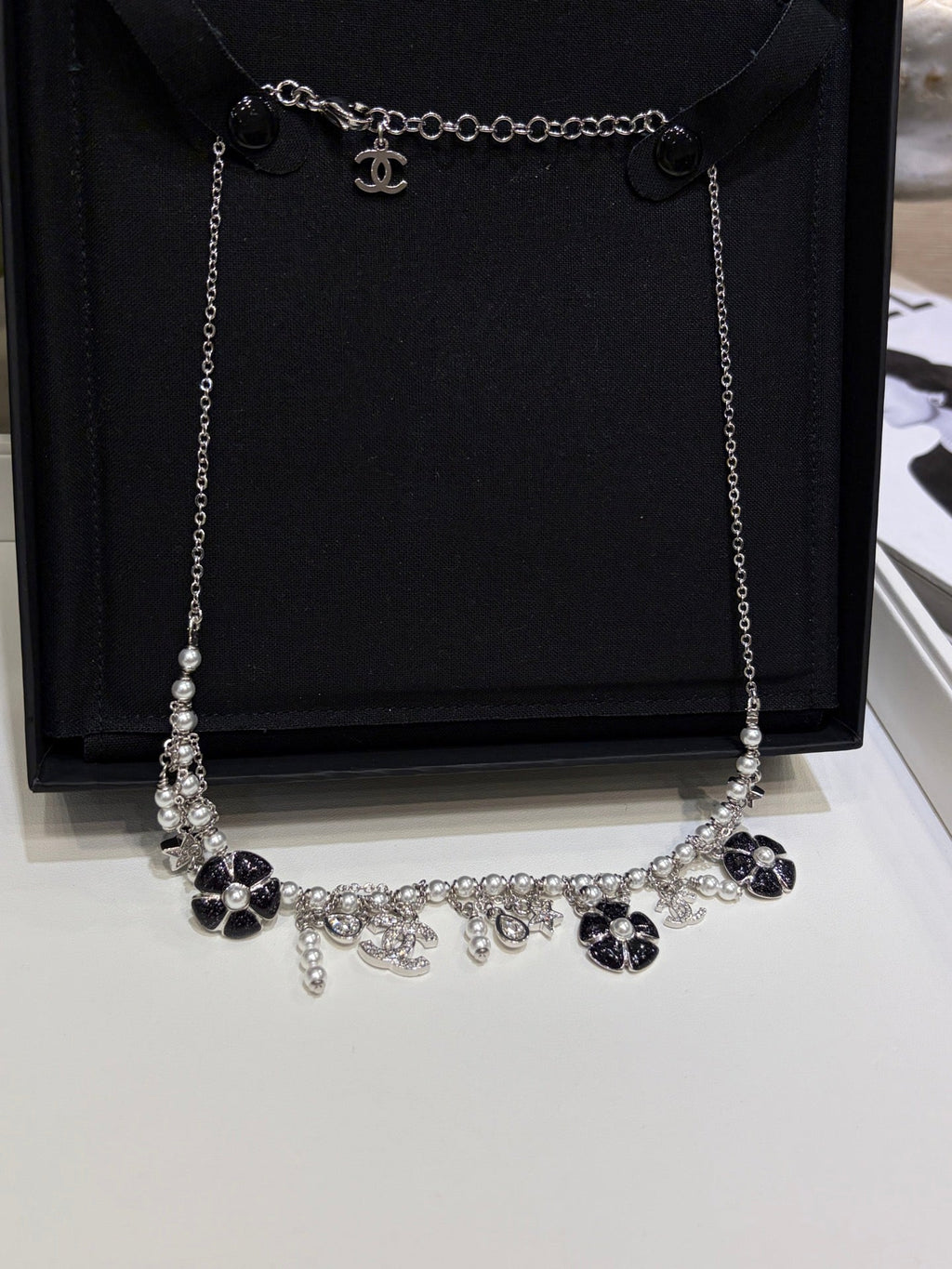 Chanel 2026 Silver Double C Black Flower Pearl Tassel Necklace