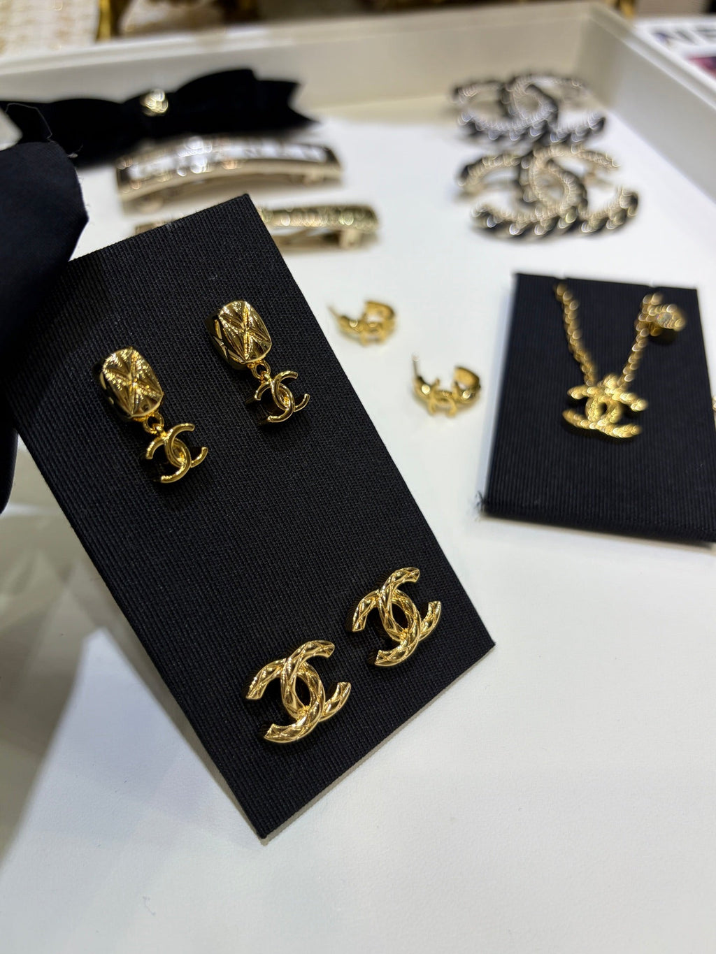 Chanel 2026 Gold Diamond Pattern Small Square Double C Pendant Earrings